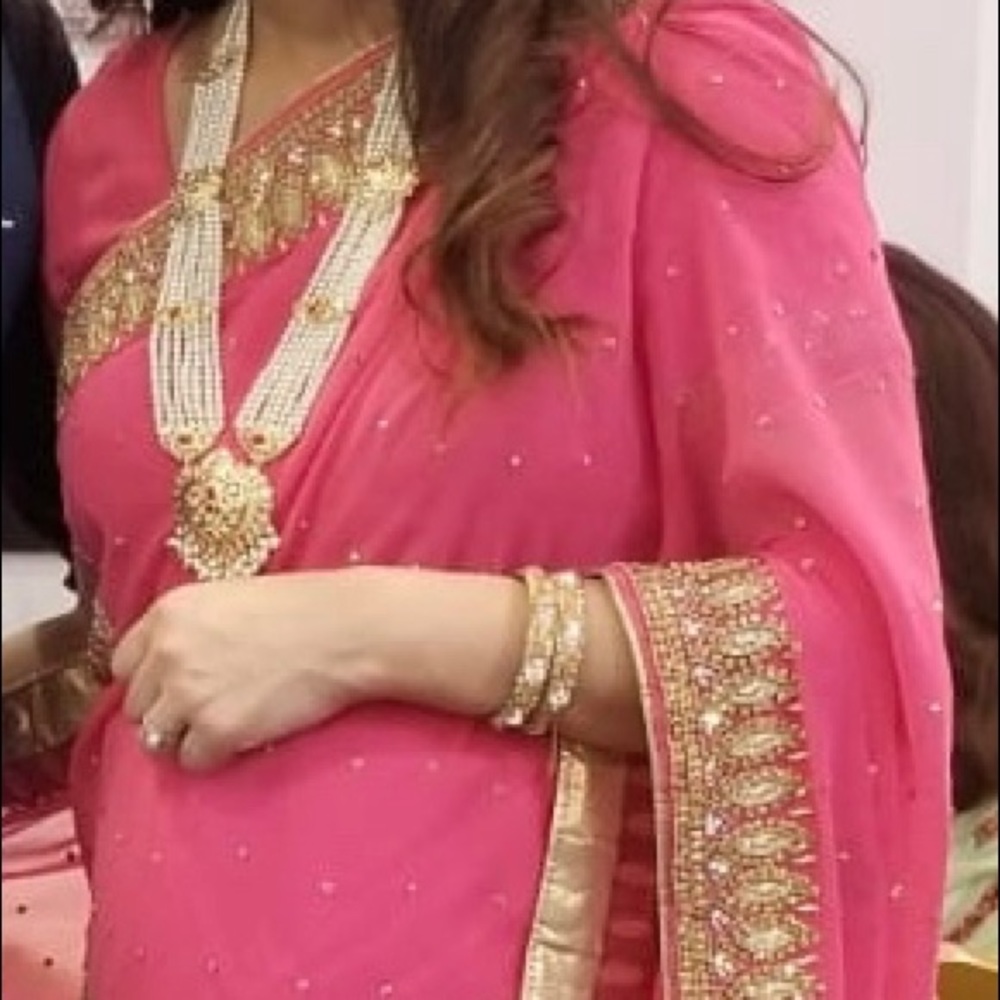 Beautiful pink heavy bridal Saree